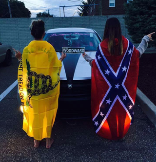 Illustration for article titled Racist girl on car group is racist, gets called out.